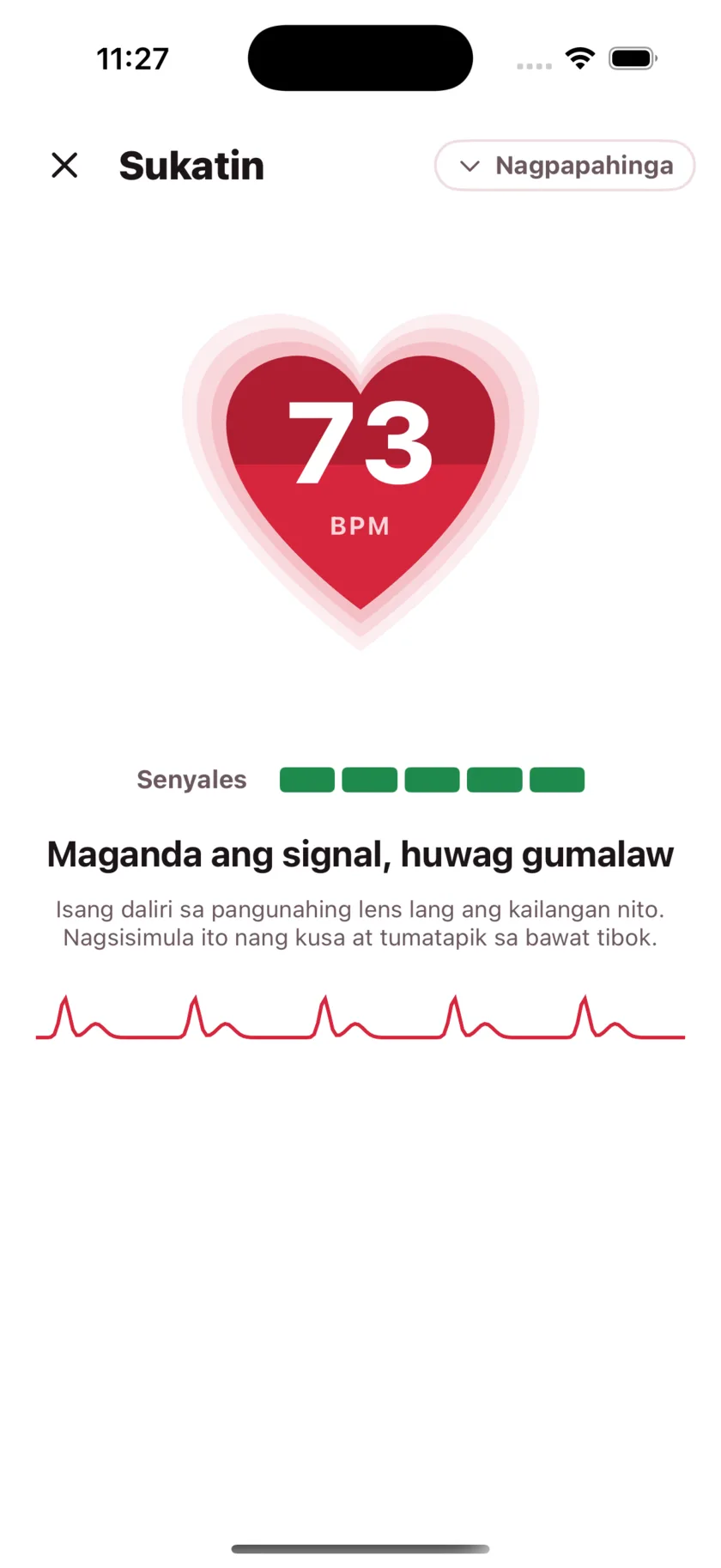 Taking a reading in HeartGlance: a large red heart filling from the bottom with 68 BPM inside it, a signal strength meter, and a live pulse trace.