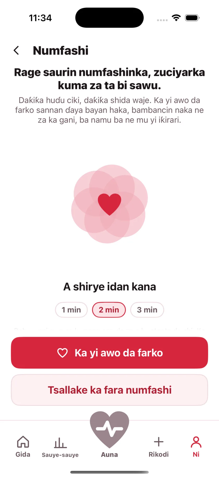 The Breathe screen: a large heart expanding and contracting, the words Breathe in, and a one, two or three minute choice.